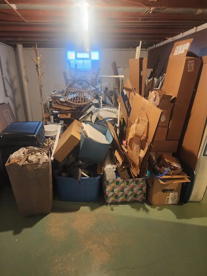 Roll-off dumpster container at job site for 15 Yard Dumpster Rental in Cedar Springs